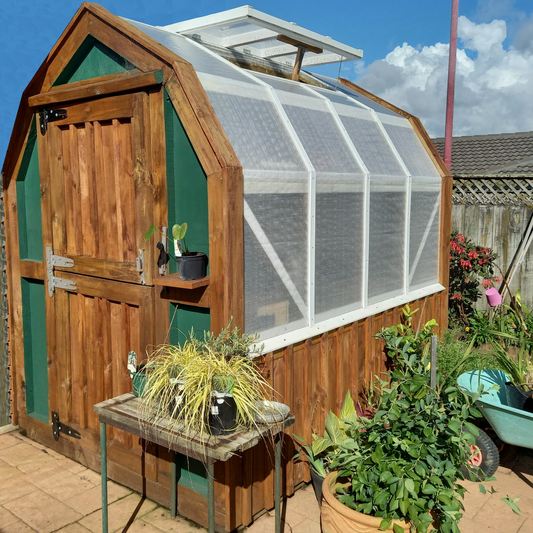 DIY plans to build a 6x8 (1.8 x 2.4m) greenhouse and potting shed
