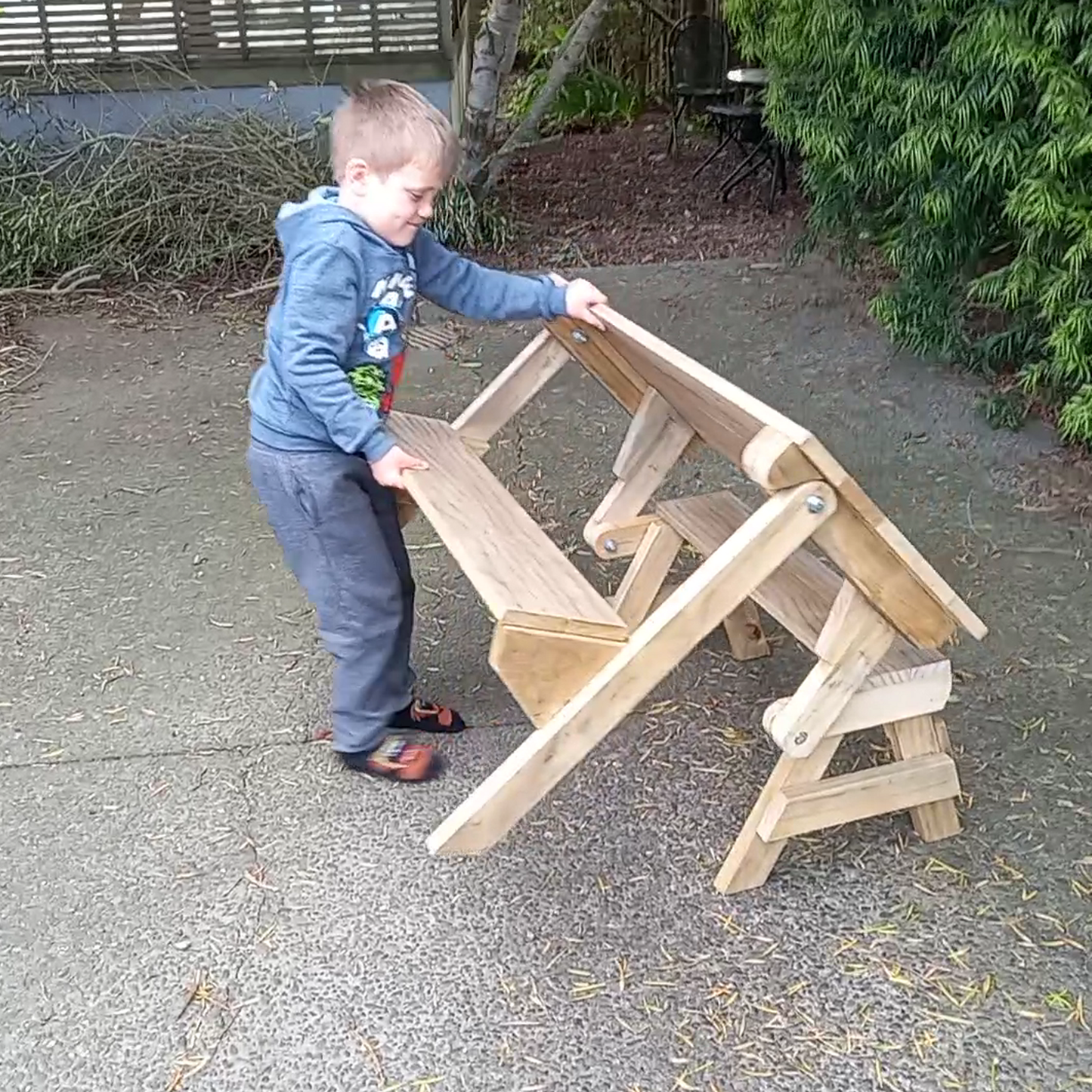 Plans to build a 3/4 size folding picnic table ideal for the kids