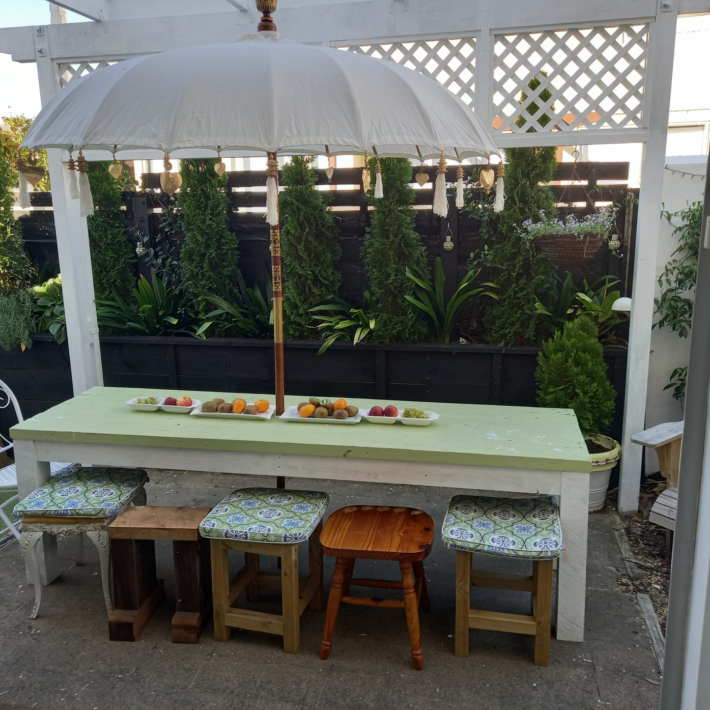 DIY plans to build a rustic 8ft (2.4m) long, narrow outdoor dining table that can seat 12 people