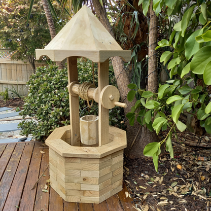 DIY plans for a garden wooden wishing well with a pyramid roof